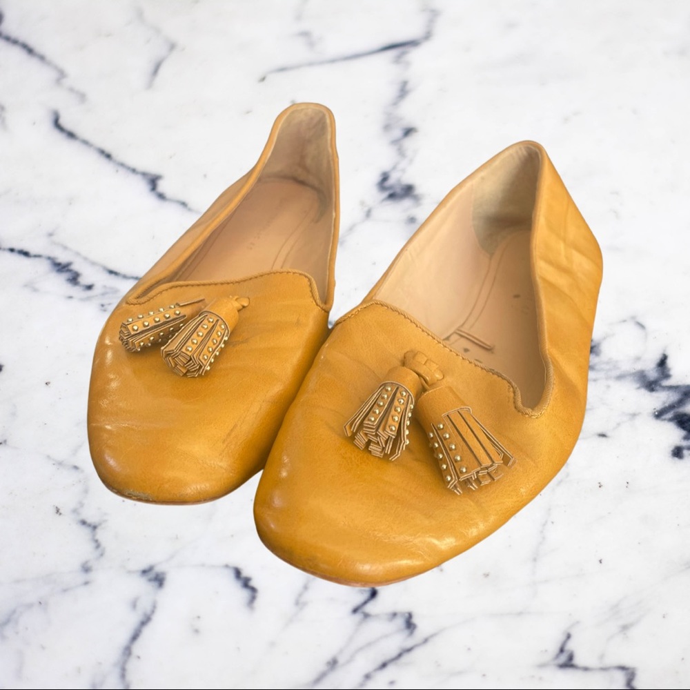 Yellow tasseled flats